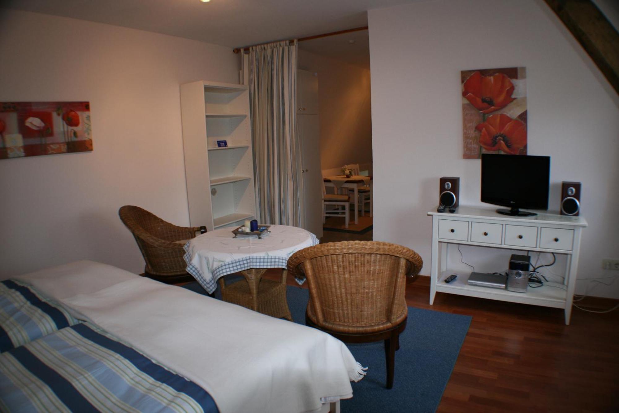 Ferienwohnungen Im Hotel Garni Zur Post Utersum Bilik gambar