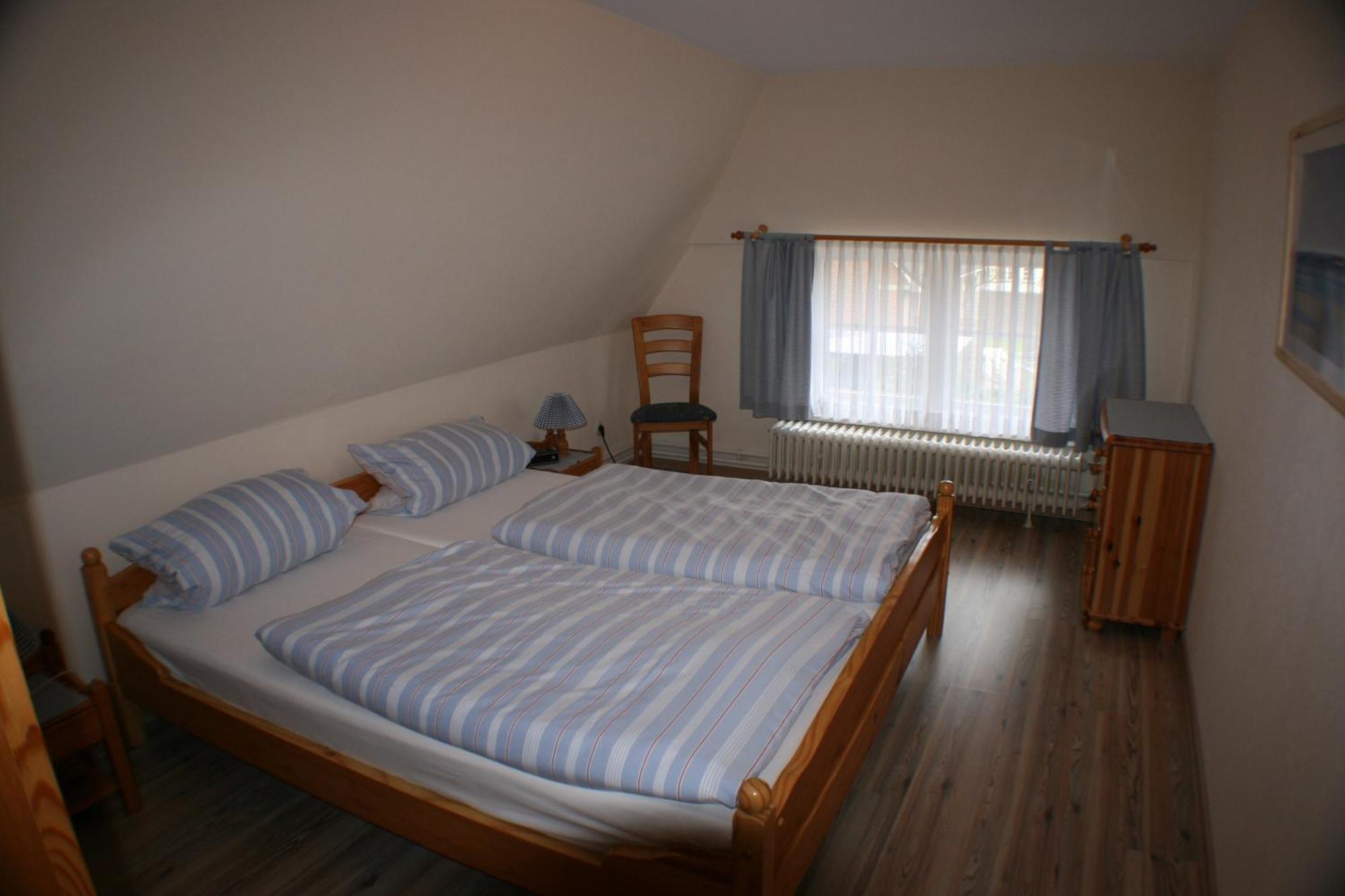 Ferienwohnungen Im Hotel Garni Zur Post Utersum Bilik gambar