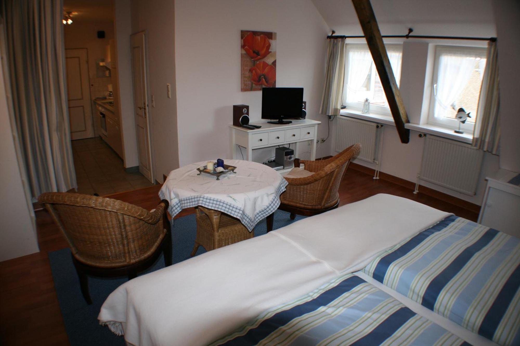 Ferienwohnungen Im Hotel Garni Zur Post Utersum Bilik gambar